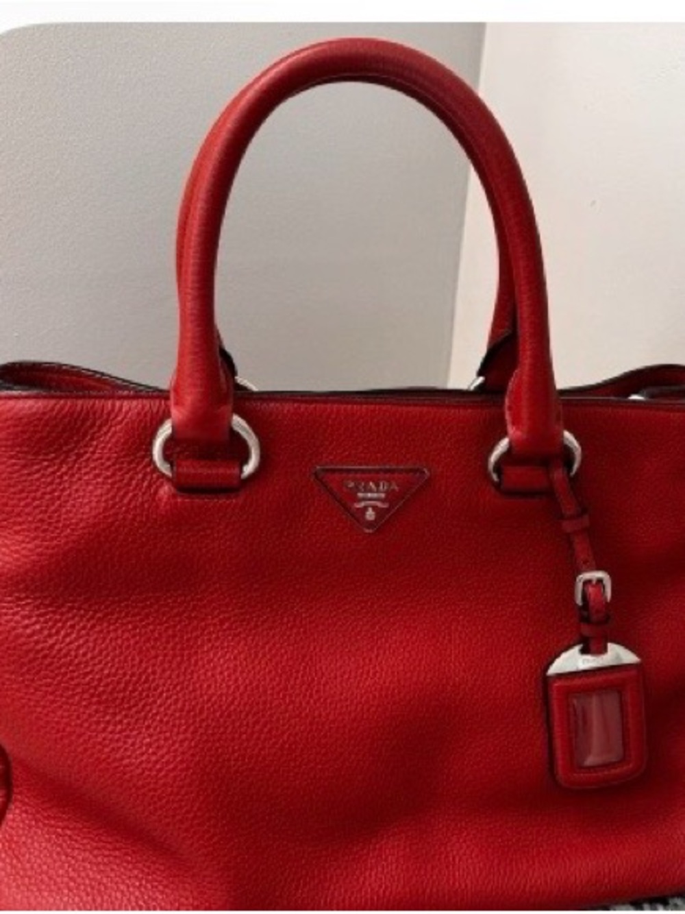 Authentic (with receipt) Prada Red Pebbled Leather Satchel with Signature Plaque